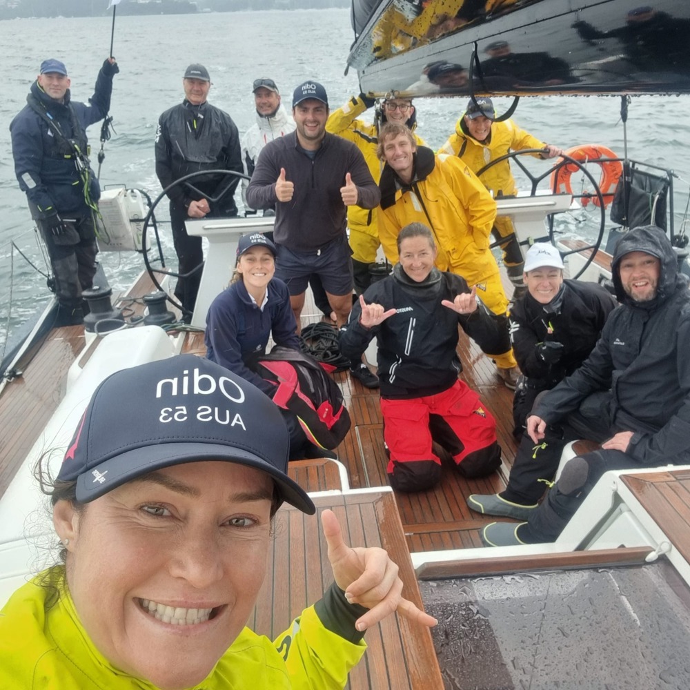 The crew of Odin in good spirits before the start despite the rain.