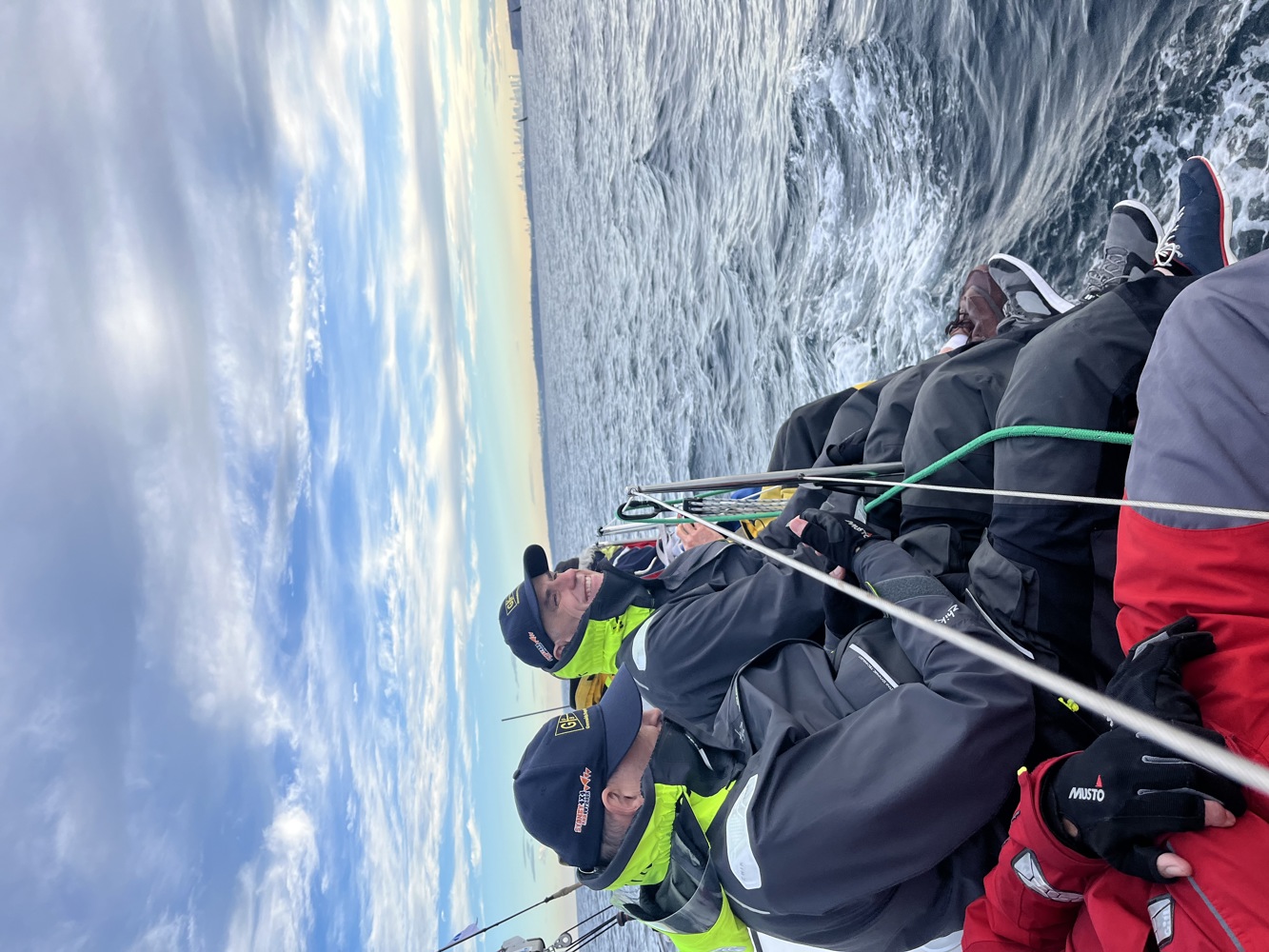 The crew of GWM Oennant Hills enjoying a bit of breeze after finally exiting the harbour