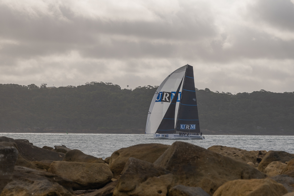 URM Group coming through the heads as she approaches the finish to take line honours in the Bird Island Race.   Image: CYCA | Vito Feremans