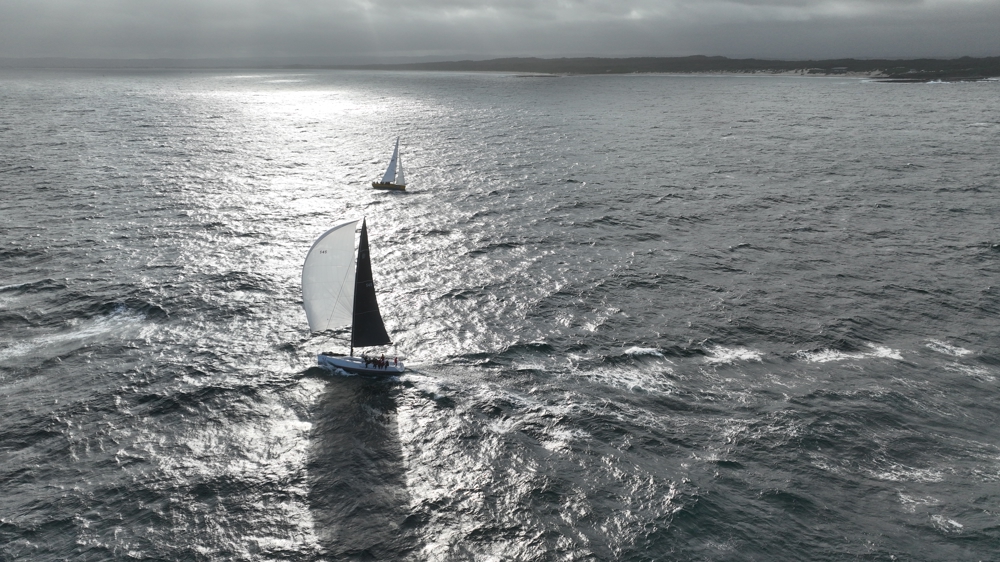 Pretty Woman heading South, passing Quetzalcoatl heading to Bird Island.   Image courtesy High Impressions Media.