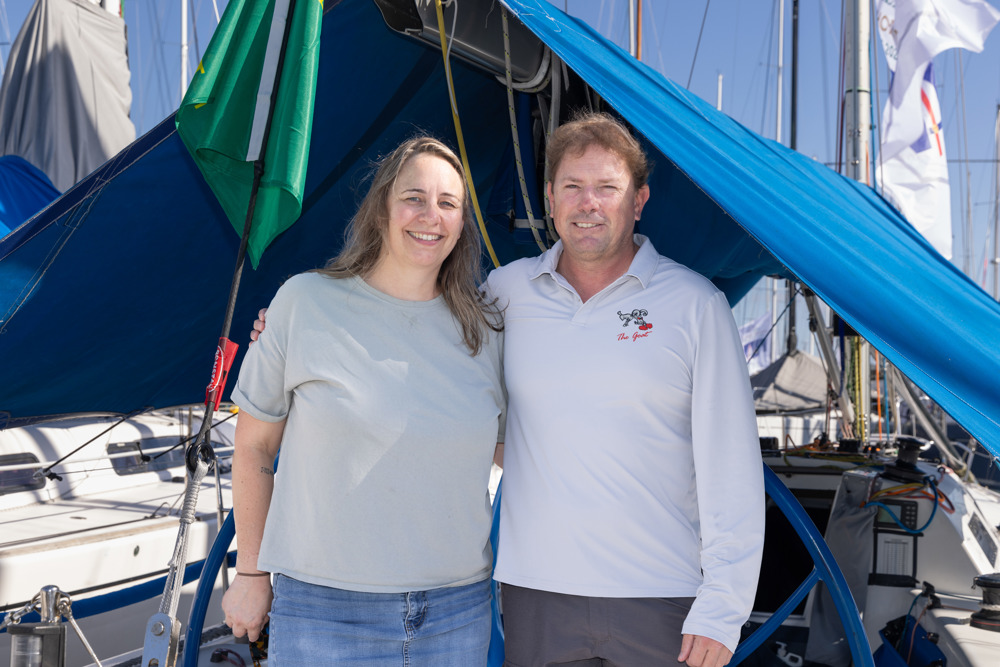 Dockside ambiance at Cruising Yacht Club of Australia - Emma Grafton with Troy Grafton who is crewing on The Goat.