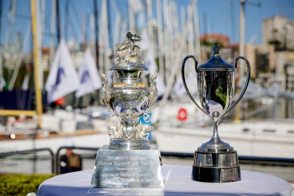 RSHYR 2024 dockside ambience - the two major trophies - George Adams Tattersall Cup (l) for overall winner and John H Illingworth Challenge Cup for the line honours boat..   Image: CYCA | Salty Dingo