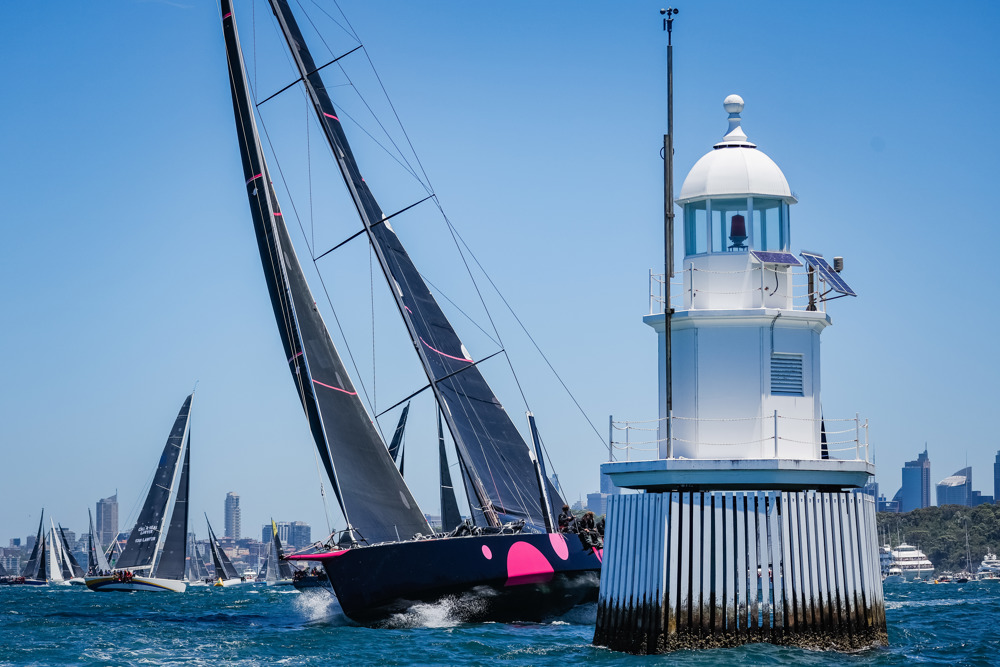 Wild Thing 100 passing close to the "Wedding Cake" in Sydney Harbour.   Image: CYCA | Salty Dingo
