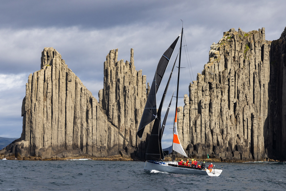 Damien Parkes' TP52 Denali off Tasman Island under a triple headed rig with trysail up.