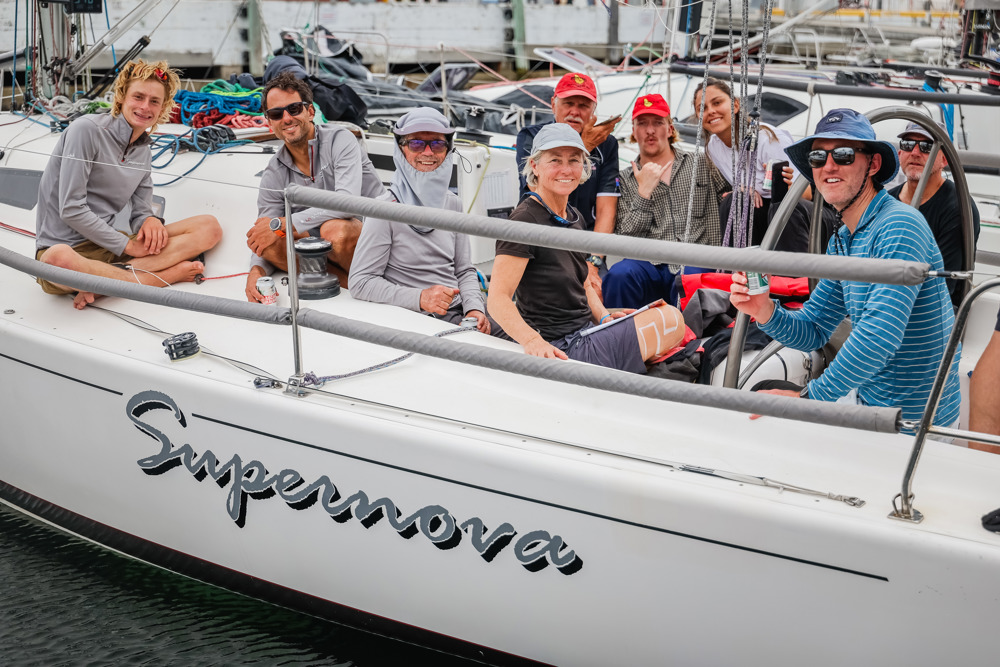 The Supernova crew and family/friends relaxing on board.      Image: CYCA | Salty Dingo