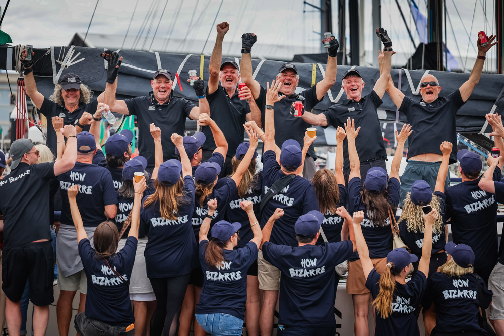 The Fisher + Dasher How Bizarre support crew salute the boat crew.      Image: CYCA | Salty Dingo