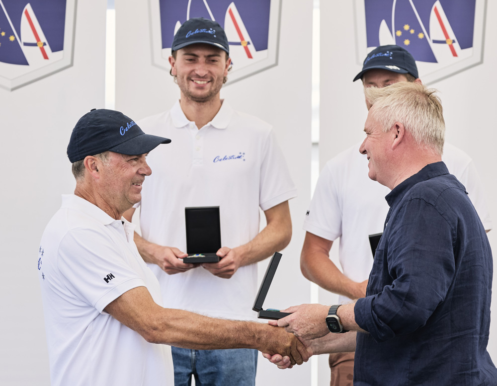 The Honourable Jeremy Rockliff, Premier of Tasmania, presenting an Overall Winner Medallion to Sam Haynes, skipper of Celestial V70.    