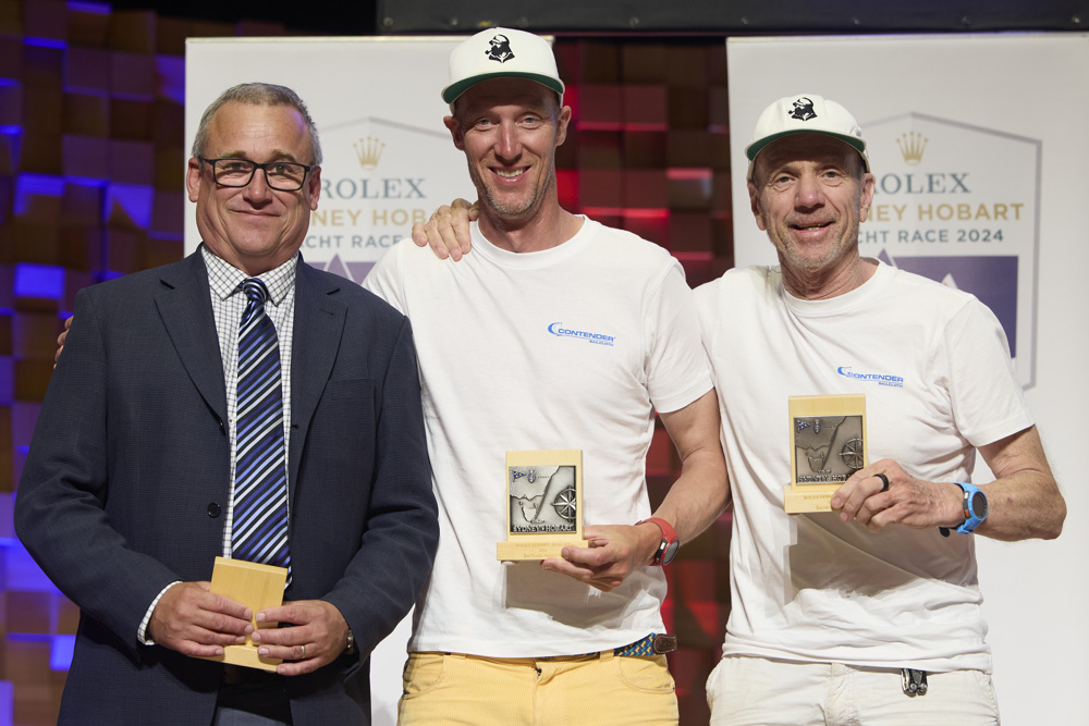 Disko Trooper_Contender Sailcloth, 3rd Double Handed Line Honours, 2nd IRC Division 5, 2nd DOuble Handed IRC - presented by Mr Michel de Vos (Tasports Group Executive) to co-skippers Jules Hall (l) and Jan Sholten.     