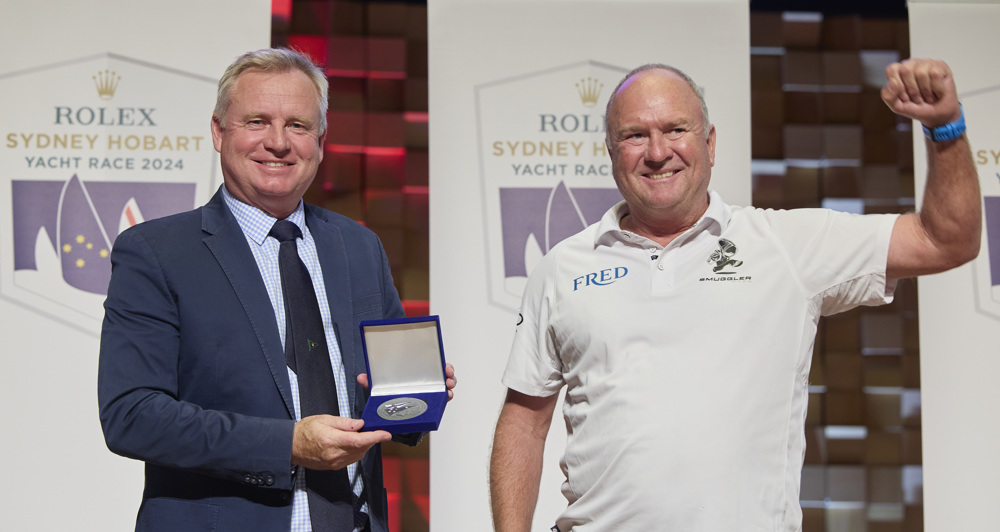Steve McConaghy receiving his medallion for 25 Sydney Hobarts, presented by The Honourable Jeremy Rockliff, Premier of Tasmania.     