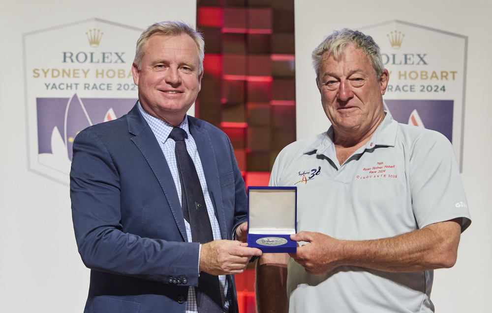 Chris Rockell receiving his medallion for 25 Sydney Hobarts, presented by The Honourable Jeremy Rockliff, Premier of Tasmania.    