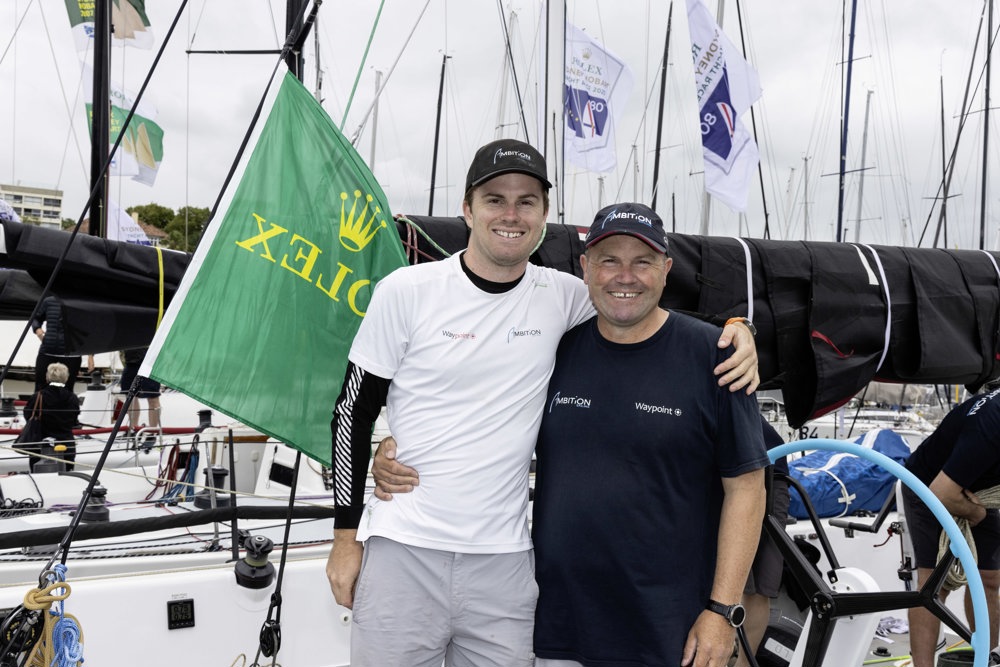 Lockie and dad Chris Dare onboard “Ambition”.    