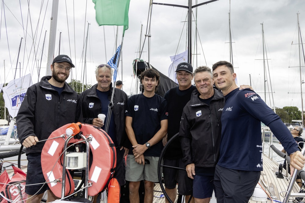 Left to right: Todd and father MIck Stewart, Haakon and father Peter Britt, Tim and son Jack MacGillvray  on ‘Mudgee Concrete’.    