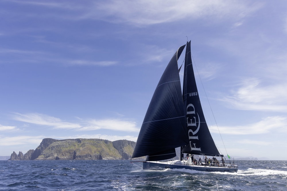 Rounding Tasman Island 

SMUGGLER, Sail No: 6952, Owner and Skipper: Sebastian Bohm, Club: CYCA, NSW, Design: TP52, LOA (m): 15.9, Year: 2006