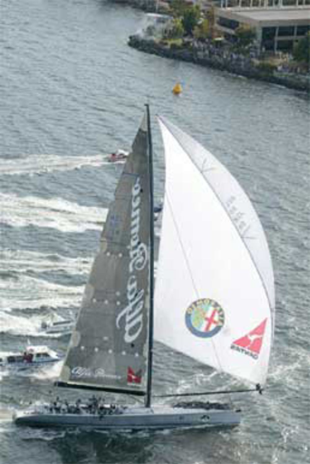 Alra Romeo crosses the finish line to claim line honours, 2002.