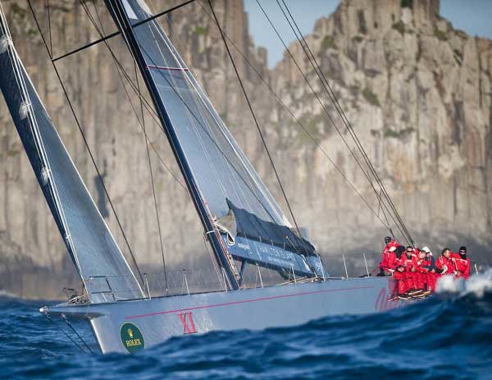 Wild Oats XI passing Tasman Island on their way to be second over the line, 2009 Rolex Sydney Hobart