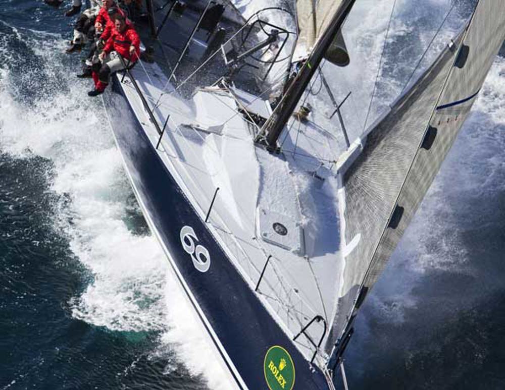 Rob Hanna and his crew aboard Shogun, surfing their way through waves on the way to Hobart