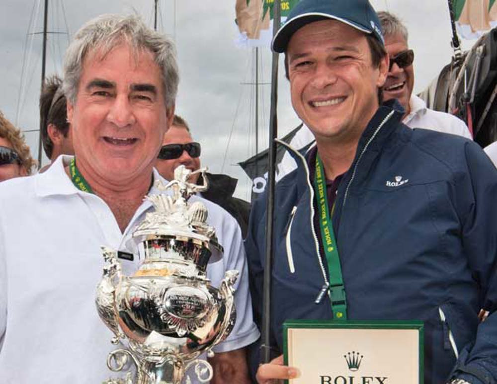Geoff Boettcher accepting the Tattersall's Cup and Rolex Yacht Master from Patrick Boutellier, Rolex Australia, after being named as the overall winner of the 2010 Rolex Sydney Hobart Yacht Race.