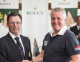 Chris Bran, Brannew, accepts the trophy for placing second IRC Division 3, from CYCA Commodore Howard Piggott