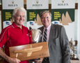 Roger Hickman, owner Wild Rose, accepts the Sir Arthur Warner Trophy for first IRC Division 4, from Paul Weedon, Chairman, TasPorts