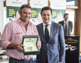 John Hildebrand, Wild Oats XI, is presented with the Rolex Yacht-Master by Patrick Boutellier, General Manager, Rolex Australia