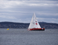 Switzerland crosses the finish line at the end of the Clipper Round the World race, a category of the Sydney to Hobart yacht race at Constitution Dock in Hobart, Monday, Dec. 30, 2013. (AAP Image/Heath Holden) NO ARCHIVING, EDITORIAL USE ONLY