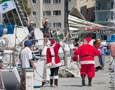 Santa Claus walking the CYCA Marina to visit the crew of Dawn Star