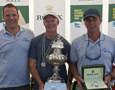 Andrew Saies and crew of Two True with the Tattersalls Cup and Rolex Yachtmaster