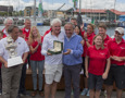 Roger Hickman, Owner Wild Rose, and crew receive the Tattersall's Cup and a Rolex Timepiece.
Front row: Richard Batt,  Commodore Royal Yacht Club of Tasmania, John Cameron, Commodore Cruising Yacht Club of Australia, Roger Hickman, Jean-Nöel Bioul, Rolex SA.