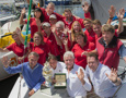 Roger Hickman, Owner Wild Rose, and crew receive the Tattersall's Cup and a Rolex Timepiece.
Front row: Jean-Nöel Bioul, Rolex SA, John Cameron, Commodore Cruising Yacht Club of Australia, Roger Hickman, Richard Batt,  Commodore Royal Yacht Club of Tasmania.