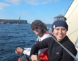   Youth Sailing Academy students Eric Sparkes and India Howard on the rail of Wax Lyrical soon after exiting Sydney Harbour