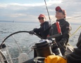 Louise Stevenson steering Wax Lyrical, with Dinah Eagle trimming, as they head North