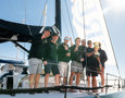 Some of the crew of Smuggler celebrating their win.    Image: CYCA | Ashley Dart