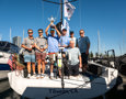 The crew of Bacchanal celebrate with their trophies.    Image: CYCA | Ashley Dart