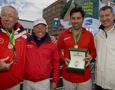Bob Oatley, Mark Richards and Robbie Naismith of Wild Oats XI with Rolex Australia General Manager Richard de Leyser at the dock after their third Line Honours win