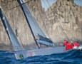 Wild Oats XI passing Tasman Island on their way to be second over the line, 2009 Rolex Sydney Hobart