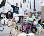 Richard Lord, CEO Assistance Dogs, Sam Haynes (Celestial) and Abby Matthews and her dog Jemima