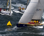 Lithuanian entry Ambersail rounding the turning mark in Sydney Harbour
