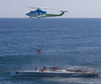 Injured crew on Maximus being transferred to a helicopter