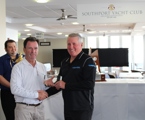 Chris Bran, Brannew, accepts the trophy for his overall win in the 28th edition of the Sydney Gold Coast Yacht Race. Credit Southport Yacht Club Staff