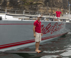 Wild Oats XI crewman, Nathan Ellis, shows off the yacht’s radical new carbon fibre, hydrofoil wing