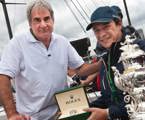 Geoff Boettcher accepting his Rolex Yacht Master timepiece from Patrick Boutellier, Rolex Australia