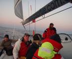 All weight to leeward aboard Colortile in extremely light airs