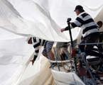 Andrew Short's Pricewaterhouse Coopers retrieving their spinnaker during the start of Audi Sydney Gold Coast Yacht Race