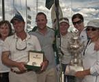 The crew of Two True celebrate after receiving the Tattersall's Cup dockside and the Rolex Yacht-Master timepiece