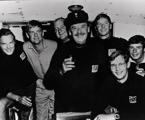 1970 Sydney Hobart Pacha crew.  L to R: Anthony Crichton-Brown, Mark Tostevin, Colin Burnell, Robert Crichton-Brown, John Wigan, Gruce Gould, Graeme Ewing. Missing from picture: Stan Darling (Navigator), Peter Green (Sailing Master), Bill Bold.