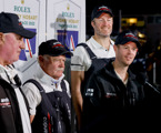 Andoo Comanche skipper John Winning Jr. and other crew members at teh dockside presentation after the finish