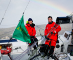 Rupert Henry (L) and Jack Bouttell (R), co-skippers of Mistral, approaching the finish line