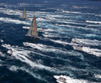 Wild Oats XI and Alfa Romeo lead the Rolex Sydney Hobart fleet out of Sydney Harbour