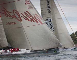Investec LOYAL and Wild Oats XI neck and neck up the harbour