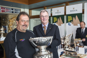 Warwick Sherman, Occasional Coarse Language Too, receives the Peter Allsop Memorial Trophy for 1st IRC Division 2 from Peter Underwood AC, the Governor of Tasmania